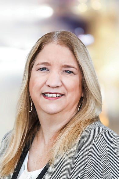 Portrait of Christine Basham, REALTOR® | Certified Full-Service Professional | ABR® | MRP | NRLUX.